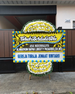 Papan Bunga Duka di Gane Timur Selatan